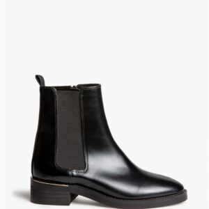 Botín Chelsea negro de mujer con elásticos laterales, tirador trasero y tacón bajo con detalle dorado, en Lybastore
